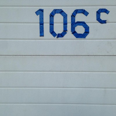 handmade blue house number 106 in Amsterdam