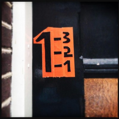 orange hand made house number 1 in Amsterdam