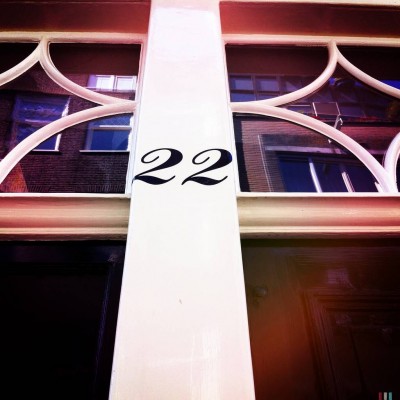 house number 22 on the door facade in Amsterdam