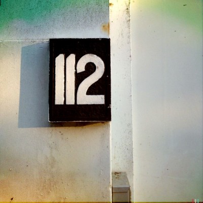 Retro house number 112 in Amsterdam